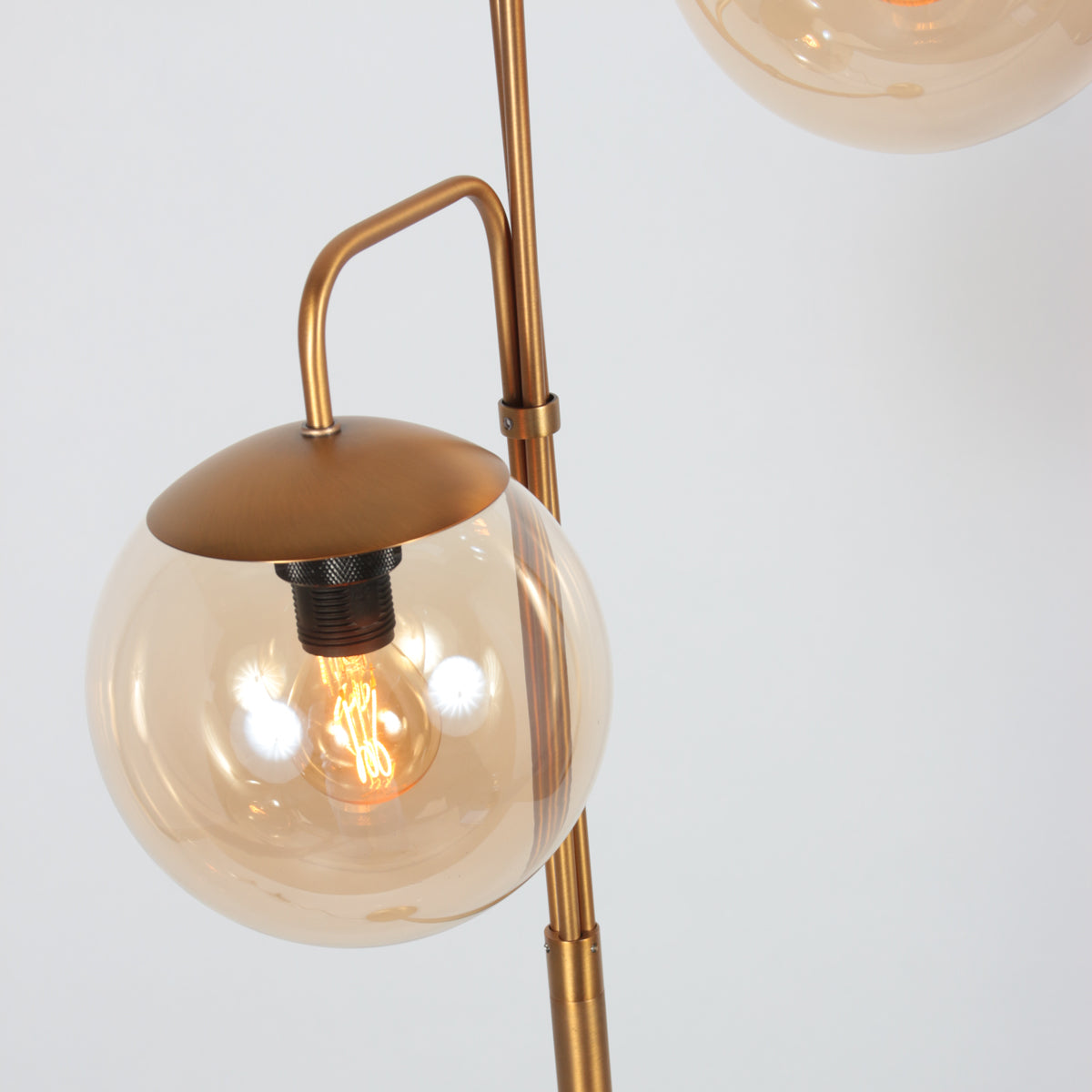 steinhauer-bollique-vloerlamp-met-drie-amberglazen-bollen-in-brons-variant-image3