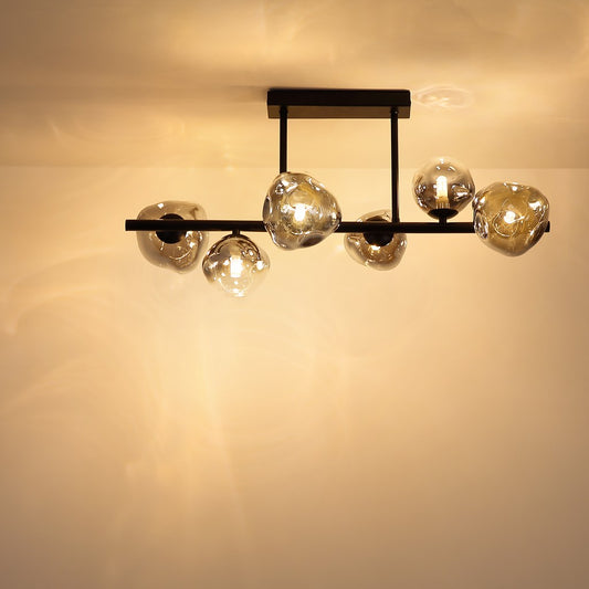 Zwarte metalen plafondlamp met smoke glazen bollen en rechte armen – sfeerbeeld