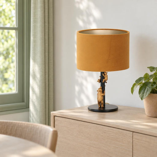 Trendy czarna lampa stołowa ze złotą rodziną zwierząt Animaux – zdjęcie aranżacyjne