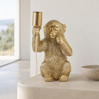 Monkey bordslampa i guld – Light & Living – miljöbild