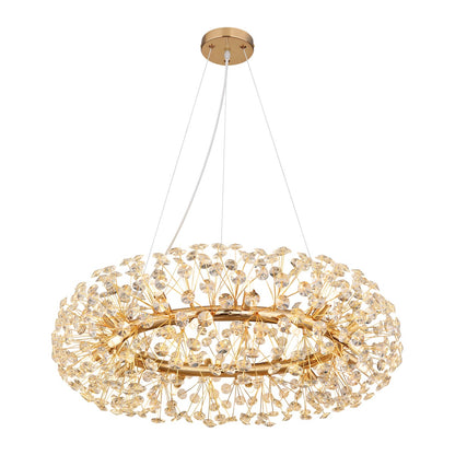 Lampadario in cristallo dorato e illuminato