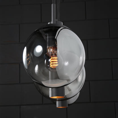 langwerpige-hanglamp-met-rookglas-bollen-en-lichtkokers-steinhauer-bollique-variant-image3