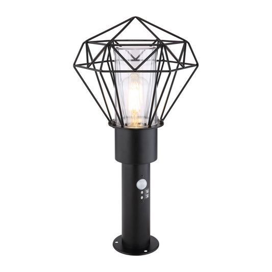 Zwarte metalen staande buitenlamp met draadframe en glazen cilinder